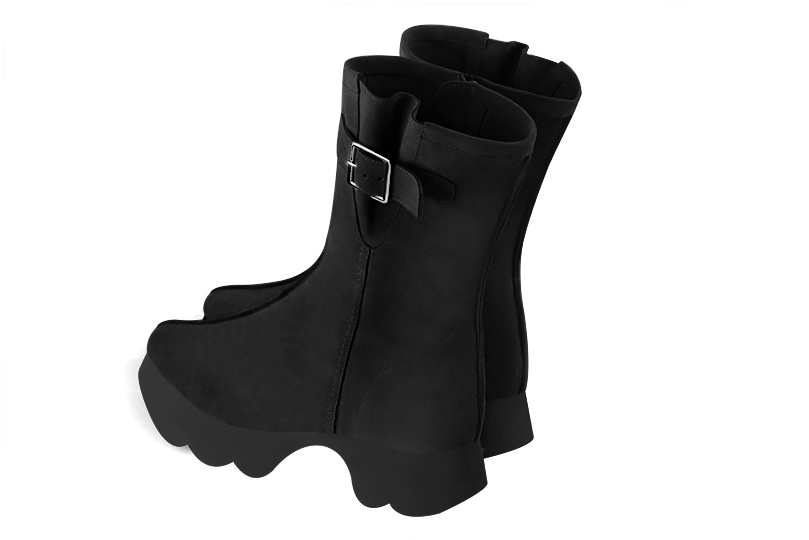 Matt black women's ankle boots with a zip on the inside. Round toe. Low rubber soles. Rear view - Florence KOOIJMAN